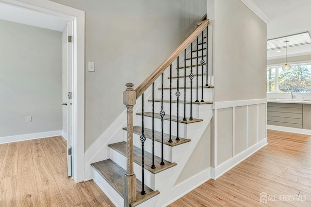 1032 3rd Ave, Manchester, NJ 08757 - stairway with wood finished floors and ornamental molding