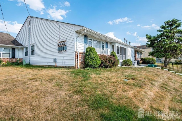 view of front of home with a front yard