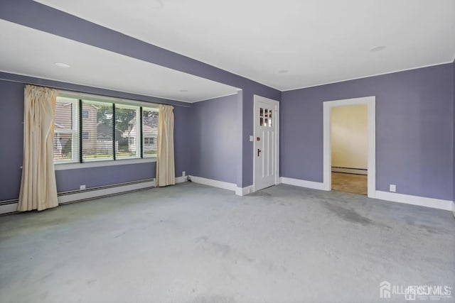 unfurnished living room with baseboard heating and baseboards