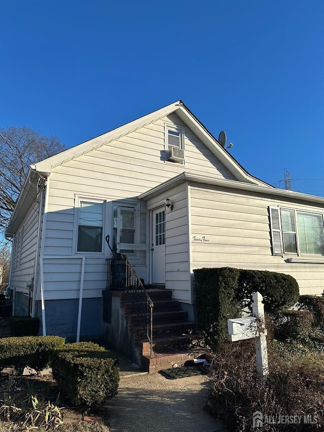 34 Livingston Ave, Avenel, NJ 07001 - view of front facade featuring cooling unit