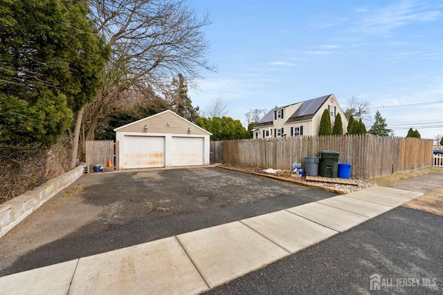 detached garage with fence