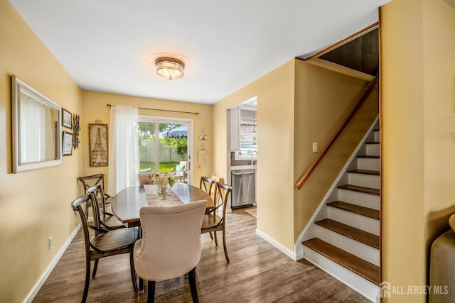 5 Wendy Rd, Woodbridge Proper, NJ 07067 - dining space featuring wood finished floors, baseboards, and stairway