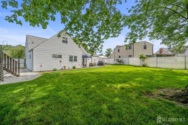 5 Wendy Rd, Woodbridge Proper, NJ 07067 - back of property with a patio, a gazebo, and roof with shingles