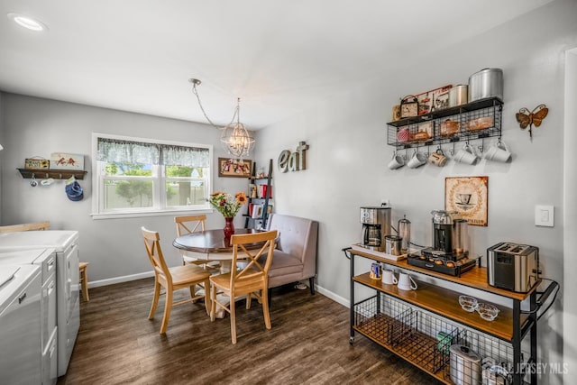 5 Wendy Rd, Woodbridge Proper, NJ 07067 - dining area with washer and clothes dryer, baseboards, dark wood-style flooring, and a chandelier