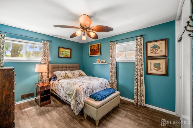 5 Wendy Rd, Woodbridge Proper, NJ 07067 - bedroom featuring multiple windows, wood finished floors, and baseboards