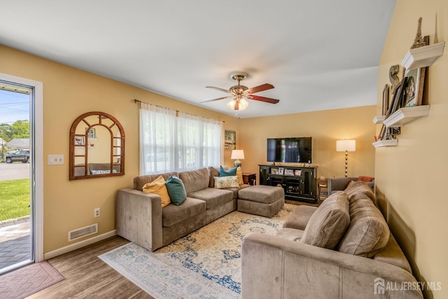 5 Wendy Rd, Woodbridge Proper, NJ 07067 - living room featuring wood finished floors, a ceiling fan, and baseboards