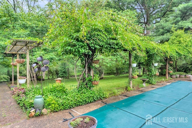 605 Beechwood Ave, Middlesex, NJ 08846 - view of pool with a pergola, a covered pool, and a yard