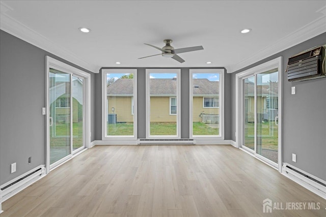 unfurnished sunroom featuring a baseboard heating unit, a wall mounted air conditioner, and ceiling fan