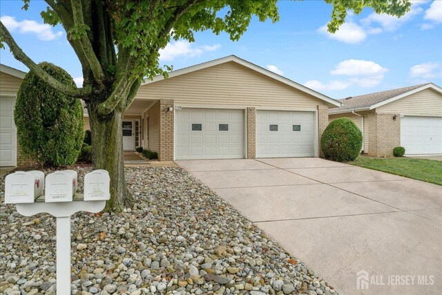 ranch-style home with a garage