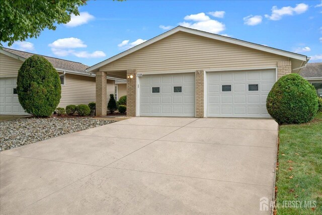 ranch-style home with a garage