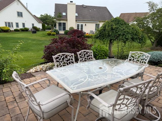 102 Leeds Ln, Monroe, NJ 08831 - view of patio featuring outdoor dining space
