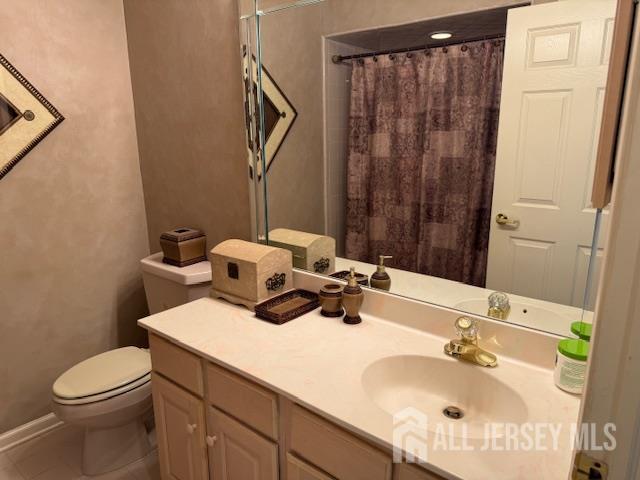 102 Leeds Ln, Monroe, NJ 08831 - full bath featuring vanity, tile patterned flooring, and a shower with shower curtain