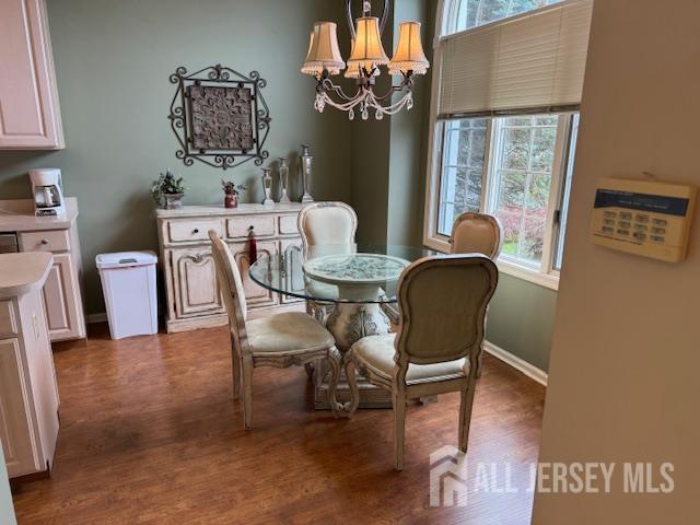102 Leeds Ln, Monroe, NJ 08831 - dining space featuring a chandelier and wood finished floors