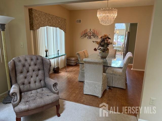 102 Leeds Ln, Monroe, NJ 08831 - dining space with a chandelier and wood finished floors