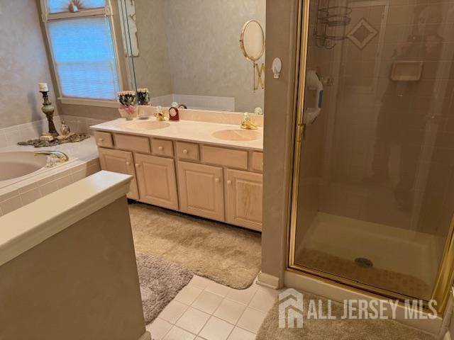 102 Leeds Ln, Monroe, NJ 08831 - full bathroom with a shower stall, a bath, double vanity, wallpapered walls, and tile patterned flooring