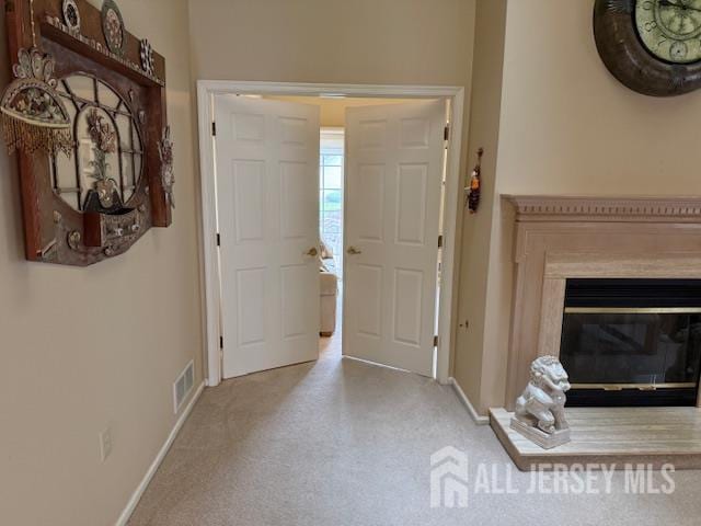 102 Leeds Ln, Monroe, NJ 08831 - carpeted foyer entrance with baseboards and a glass covered fireplace