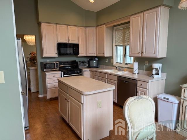 102 Leeds Ln, Monroe, NJ 08831 - kitchen with appliances with stainless steel finishes, light countertops, a kitchen island, wood finished floors, and lofted ceiling