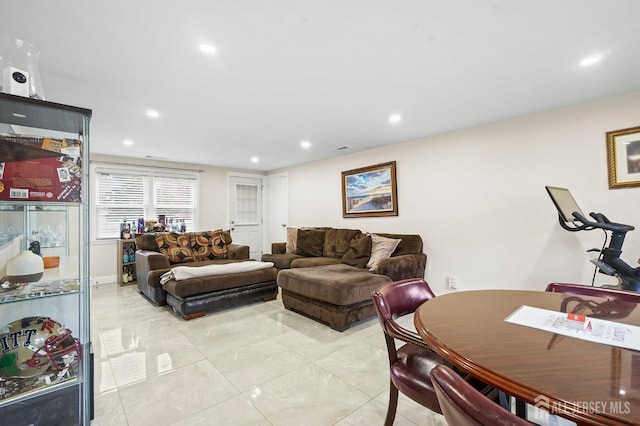 living room featuring light tile patterned flooring