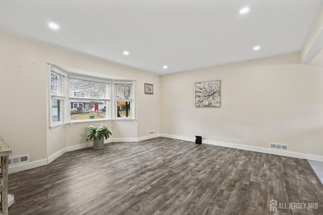 interior space with dark hardwood / wood-style flooring