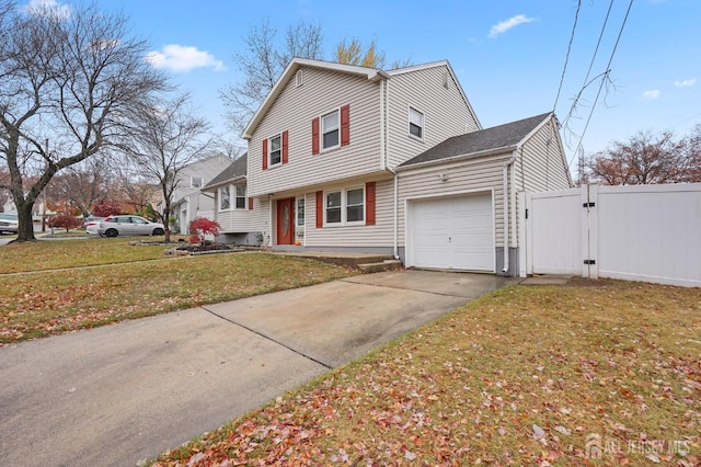 exterior space with a front yard and a garage