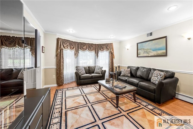 21 Tanglewood Pl, Monroe, NJ 08831 - living room featuring wood finished floors, recessed lighting, ornamental molding, and a baseboard radiator