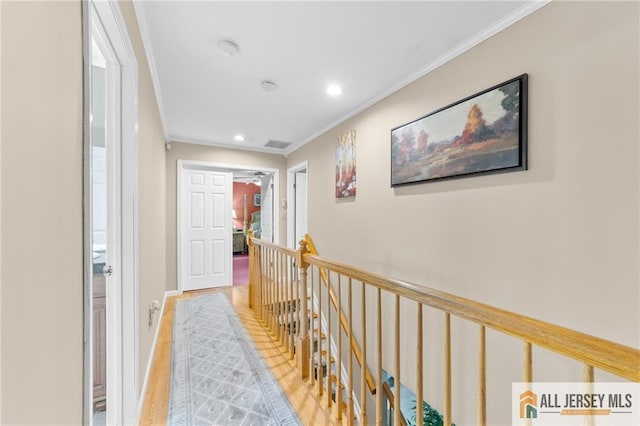21 Tanglewood Pl, Monroe, NJ 08831 - hall featuring an upstairs landing, ornamental molding, wood finished floors, and recessed lighting