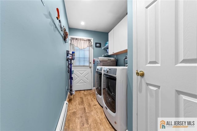 21 Tanglewood Pl, Monroe, NJ 08831 - washroom featuring cabinet space, light wood-style floors, independent washer and dryer, and baseboard heating