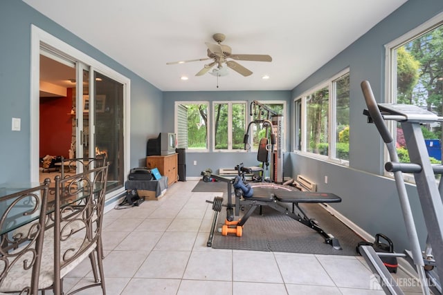 workout room with ceiling fan, baseboards, recessed lighting, and tile patterned floors