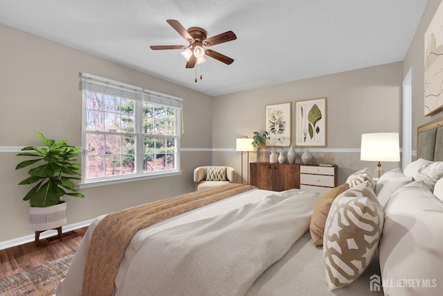 19 Albury Way N, Brunswick, NJ 08902 - bedroom with wood finished floors, baseboards, and ceiling fan