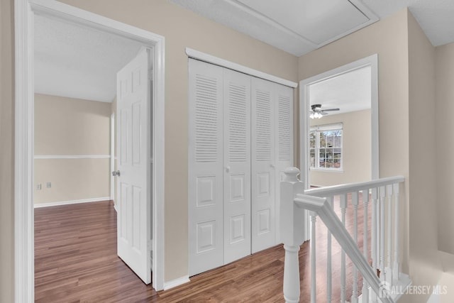 19 Albury Way N, Brunswick, NJ 08902 - hall featuring an upstairs landing, wood finished floors, and baseboards