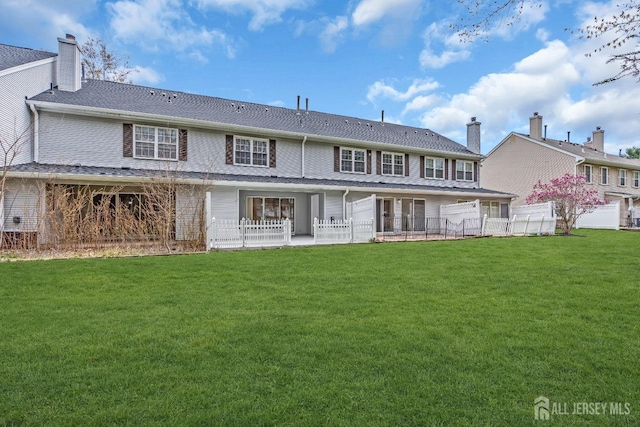 19 Albury Way N, Brunswick, NJ 08902 - rear view of property featuring a chimney