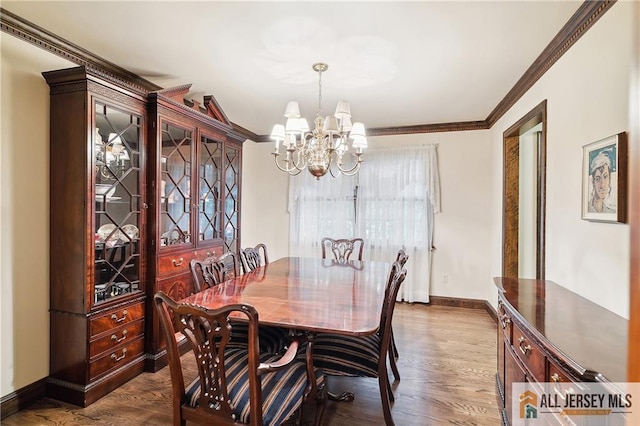 1 Eileen Ct, East Brunswick, NJ 08816 - dining area featuring a chandelier, ornamental molding, and dark wood finished floors