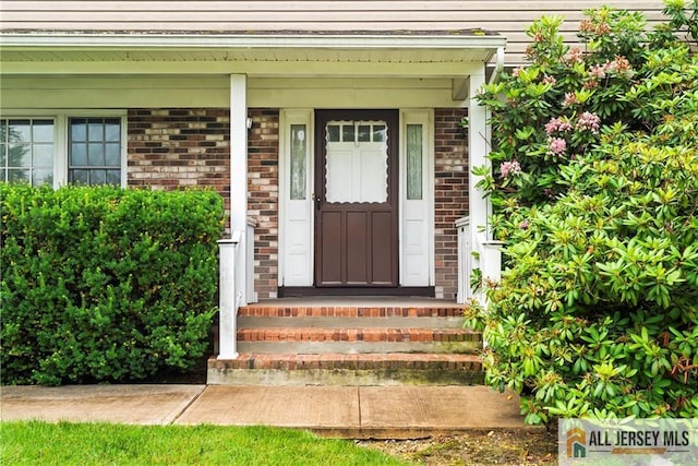 1 Eileen Ct, East Brunswick, NJ 08816 - property entrance with brick siding