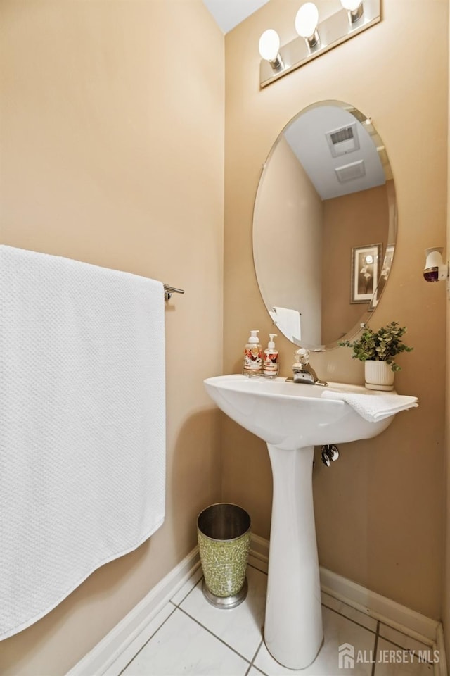 44 Windsong Cir E, Brunswick, NJ 08816 - bathroom featuring tile patterned floors and baseboards