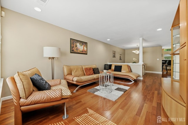 44 Windsong Cir E, Brunswick, NJ 08816 - living area featuring wood finished floors and recessed lighting