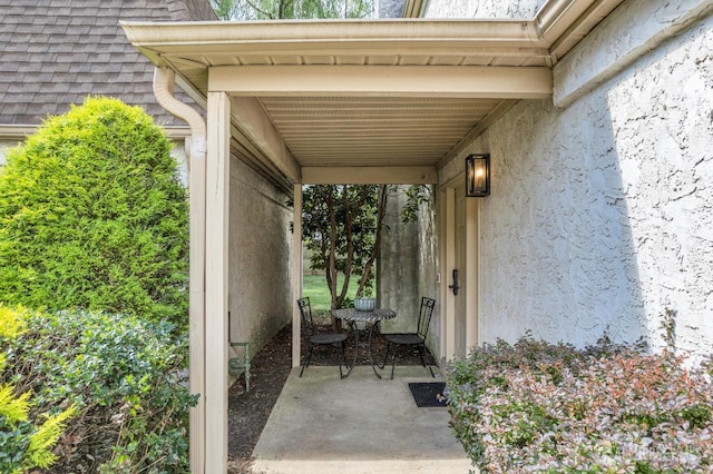 47 Park Gate Dr, Edison, NJ 08820 - property entrance with stucco siding and roof with shingles