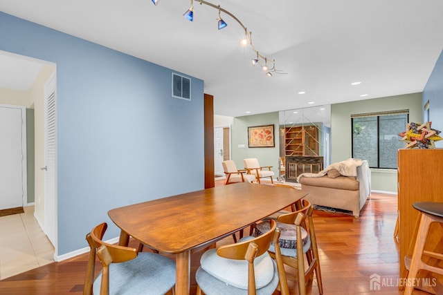 47 Park Gate Dr, Edison, NJ 08820 - dining room featuring light wood-style flooring and track lighting