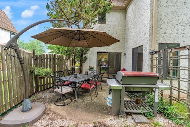 47 Park Gate Dr, Edison, NJ 08820 - fenced backyard featuring outdoor dining area, a grill, and a patio