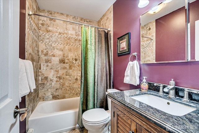 bathroom with toilet, shower / tub combo with curtain, and vanity