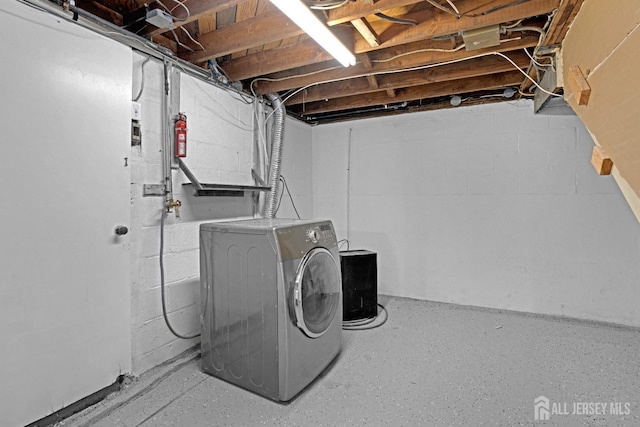 washroom featuring washer / dryer and laundry area