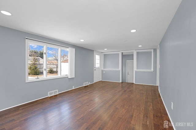 interior space with visible vents, wood finished floors, and recessed lighting