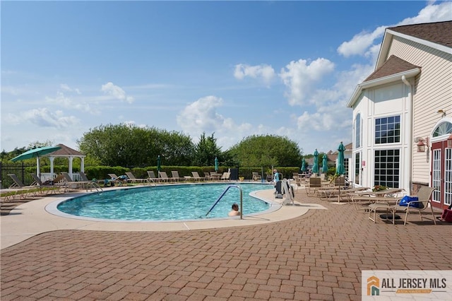 704 Schindler Dr, South Brunswick, NJ 08852 - community pool with a gazebo and a patio area