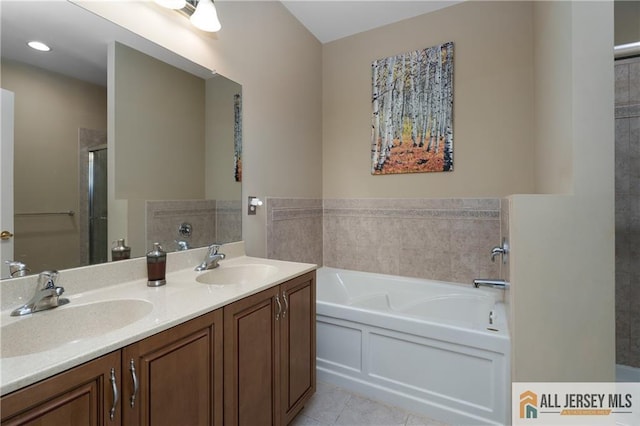 704 Schindler Dr, South Brunswick, NJ 08852 - full bathroom featuring a garden tub, a shower stall, tile patterned floors, and double vanity