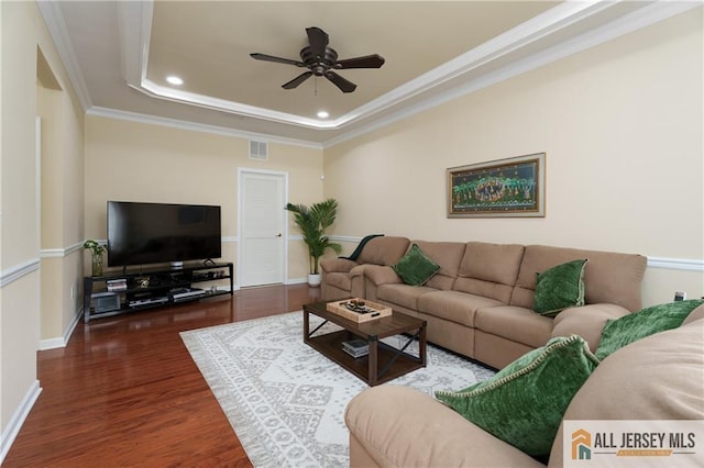 704 Schindler Dr, South Brunswick, NJ 08852 - living room featuring a raised ceiling, wood finished floors, recessed lighting, a ceiling fan, and crown molding