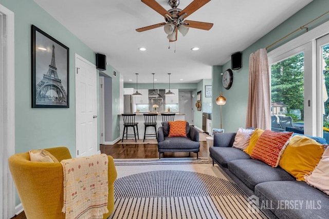 61 Lynn Ct, North Brunswick, NJ 08902 - living area featuring ceiling fan, recessed lighting, and wood finished floors