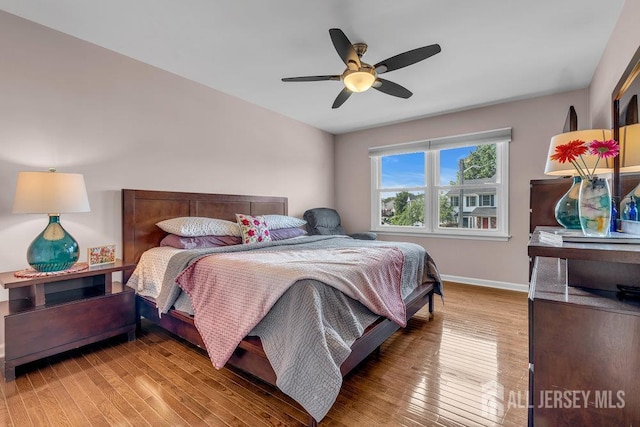 61 Lynn Ct, North Brunswick, NJ 08902 - bedroom featuring wood finished floors and a ceiling fan