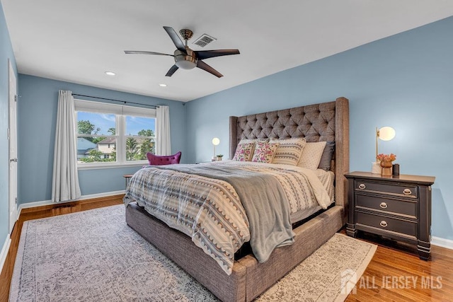 61 Lynn Ct, North Brunswick, NJ 08902 - bedroom with wood finished floors, a ceiling fan, and recessed lighting