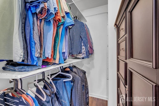 61 Lynn Ct, North Brunswick, NJ 08902 - spacious closet featuring wood finished floors