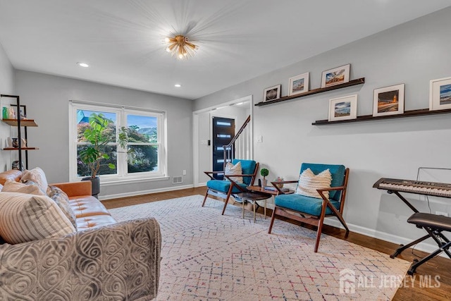 61 Lynn Ct, North Brunswick, NJ 08902 - living room featuring wood finished floors, recessed lighting, and stairway