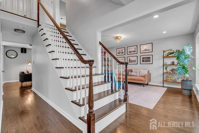 61 Lynn Ct, North Brunswick, NJ 08902 - staircase featuring wood finished floors and recessed lighting